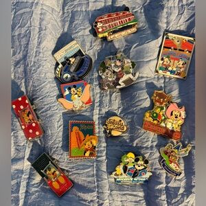 A lot of Disney collectible tradable pins LELR Dumbo and older ones htf!